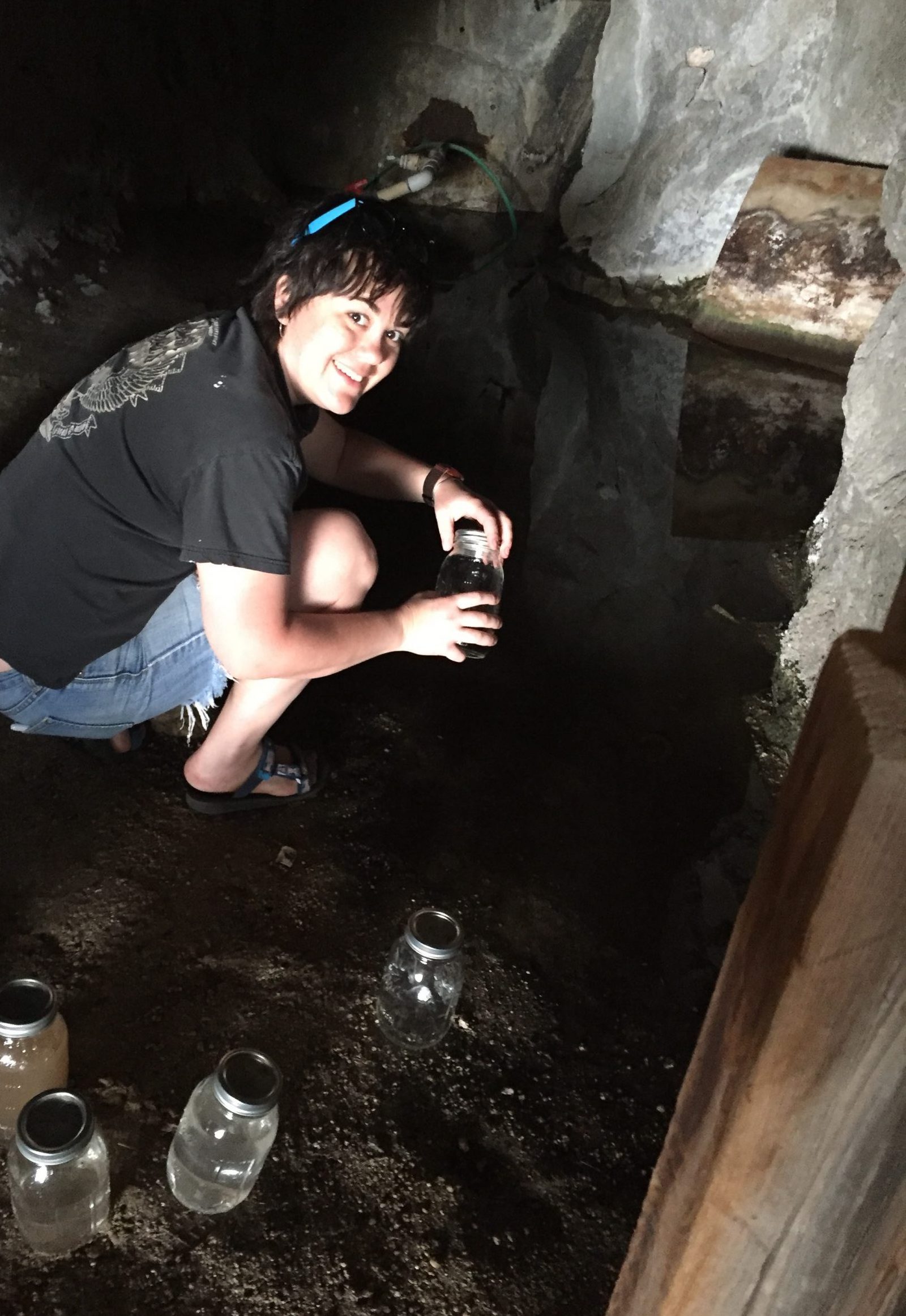 Nicole sampling standing water and soils in the Granite Mountains Desert Research Center